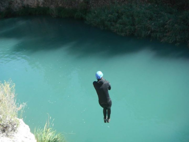  Boy jumping in a ravine